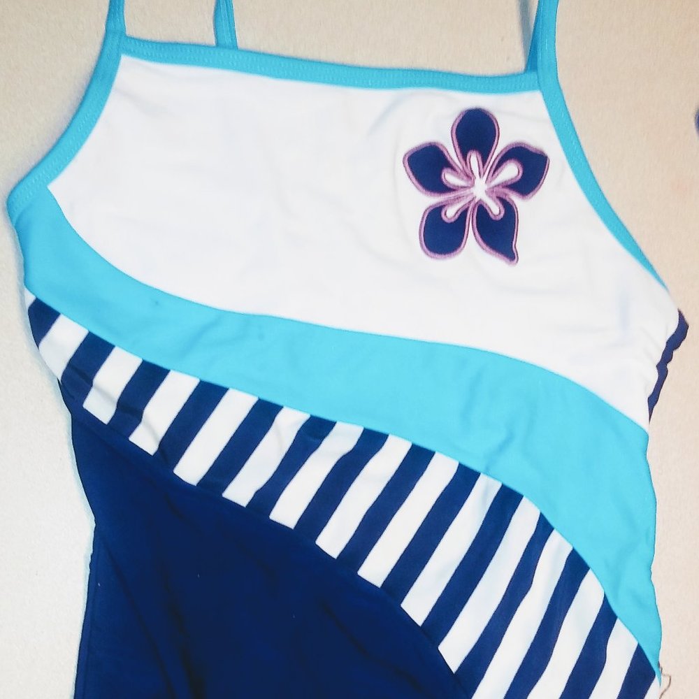 I am selling two girls multi colored swim suits